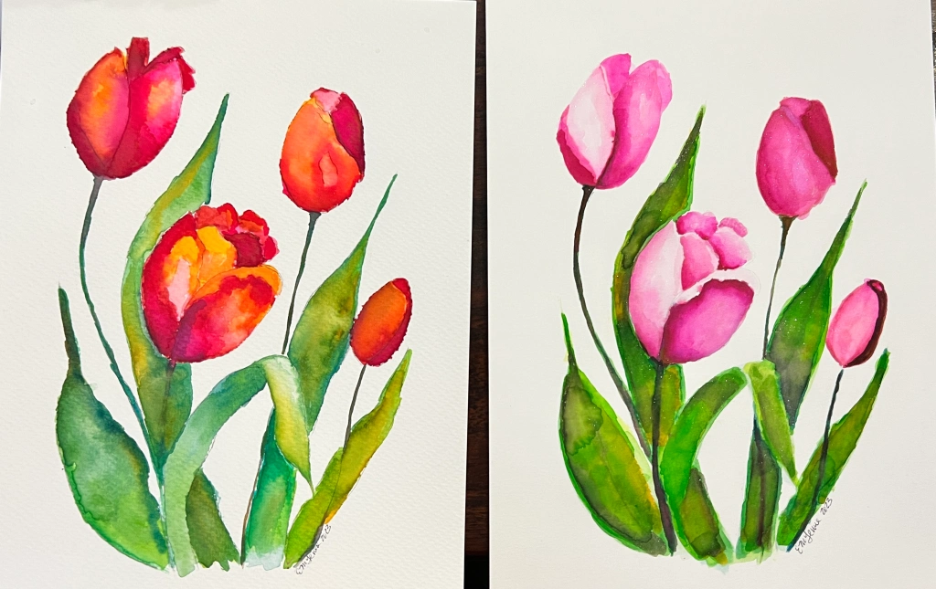 2 identical paintings one with orange tulips and one with pink tulips